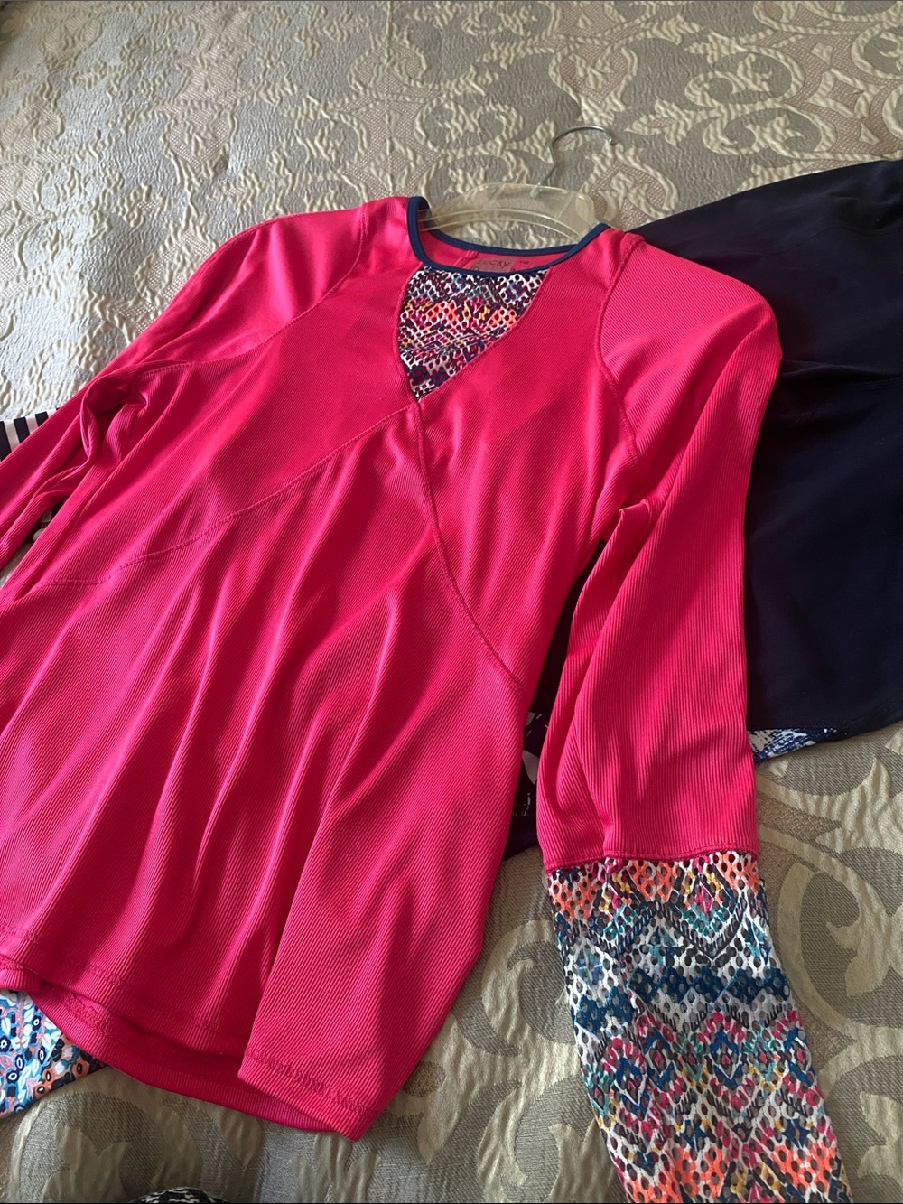 Women's Pink Long-Sleeve Performance Top with Patterned Cuffs and leggings